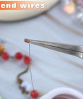 Close-up of 7 Inch Long Needle Nose Pliers For Jewelry Making And Wire Looping in action, bending wire with smooth jaws.