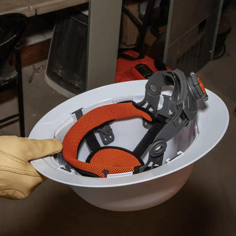 Interior view of Rugged Worksite Ready Hard Hat With Rechargeable Headlamp Full Brim Non Vented Safety Helmet showing padded sweatband.