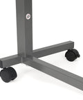 Close-up of Heavy Duty Adjustable Overbed Table With Ball Bearing Casters, showing sturdy chrome base and black locking wheels.