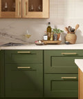 10 Pack Brushed Brass Cabinet Pulls 5 Inch With 128MM Hole Centers installed on green kitchen cabinets