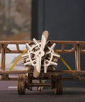 Mini Biplane 3D Puzzle Kit For Adults, Wooden Mechanical Model, DIY Craft Project, 3.15 Inch High, Hands-On Aviation Lover Gift, Classic Biplane Design, Challenging Build For Puzzle Fans And Flight Nerds front view