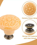 Set Of Six Bright Yellow Ceramic Cabinet Knobs Featuring Classic Floral Handles That Are Hella Durable And Ready For Zero Drama Cleanup This Total Kitchen Game Changer Adds Sweet Vintage Vibes To Any Drawer Or Cupboard Upgrade. Ceramic floral handle with iron base.