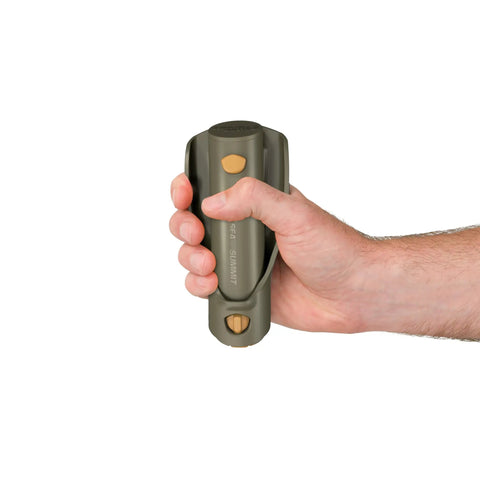 Hand holding Pocket Trowel For Backpacking And Camping With Retractable Handle And Durable Glass Reinforced Nylon 66, ultra compact.