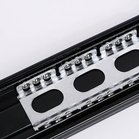 Close-up of 12-inch soft-close drawer slides, showing stainless steel ball bearing rails and mounting holes, smooth glide design.