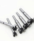 Heavy Duty Forstner Bit Set With Carbide Tips And High Speed Steel Shank, five drill bits from 15mm to 35mm for woodworking.