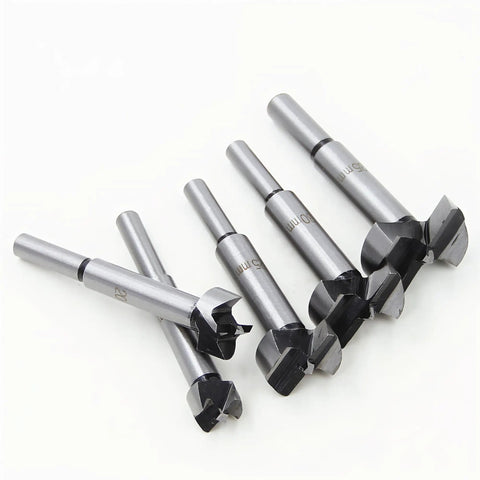 Heavy Duty Forstner Bit Set With Carbide Tips And High Speed Steel Shank, five drill bits from 15mm to 35mm for woodworking.