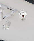 18 Pack Rock Solid Metal Fire Sprinkler Trim Rings Heavy Duty Escutcheon Plates Silver dual layer trim around sprinkler head on ceiling.