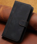 Premium Leather Shell Case For Danew Trace T-One 5 5 Inch with black finish, showcasing front view on leather background.