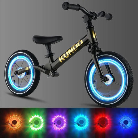 Rechargeable Bike Wheel Lights With 21 Dynamic Modes And Full Color Options Clip On Hub LEDs on black bike for night riding