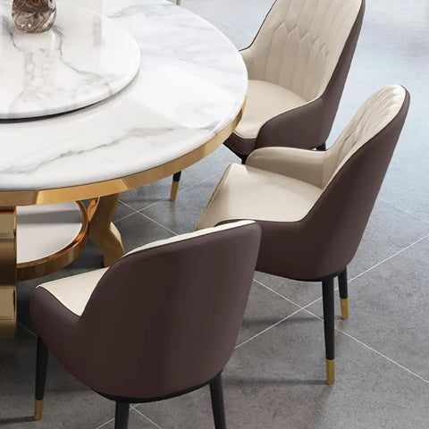 Kickback Ready Round Marble Dining Table Built For Epic Weekend Hangouts Featuring A Smooth White Spinning Lazy Susan And Bold Gold Stainless Steel Base Stretching Fifty Nine Inches Wide with elegant chairs.