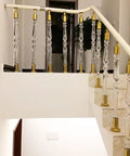 Premium Clear Acrylic Stair Spindles Deck Railing Kit With Slick Transparent Finish And Straight Up Easy Install Hardware For Modern Staircase Baluster Upgrade Kits featuring crystal clear balusters on staircase.