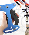 Dead On Bicycle Spoke Tension Meter For Road And City Bikes Heavy Duty Premium Aluminum Tensiometer held in hand for precise wheel truing.