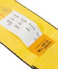 Label on Hella Tough Ratchet Tie Down Strap displaying breaking strength of 16200 lbs and working load limit.