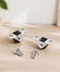 Eight Pack Of One Half Inch Rigid Caster Wheels With Compact Low Profile Design For Smooth Rolling On Desks And Furniture Includes Premium Hardware Pieces, featuring chrome wheels and metal screws.