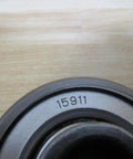 Close-up of 3377 Trolley Crane Wheel Hoist With 3 Inch Wheel Diameter showing model number 15911 on metal surface
