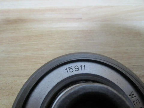 Close-up of 3377 Trolley Crane Wheel Hoist With 3 Inch Wheel Diameter showing model number 15911 on metal surface