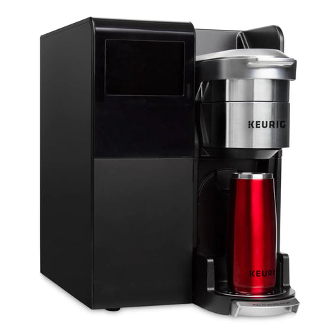 K-3500 Single Serve Commercial Coffee Maker For Busy Offices, 150 Plus Pod Varieties, side view with travel mug.