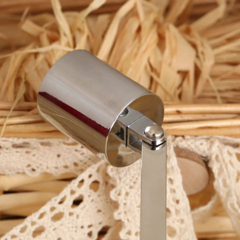 Close-up of Bad Boy Stainless Steel Candle Snuffer With Super Long Handle and Slick Silver Plating, showcasing its polished finish.