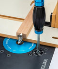 Close-up of Box Joint Router Jig With Precision Indexing For Router Table featuring steel sled and MDF base in use.