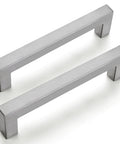 Stainless steel T knobs for cabinets and drawers, single hole centers, durable corrosion-resistant kitchen pulls shown in matte finish.