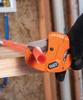 Ratcheting PVC Pipe Cutter For One Handed Use That Cuts One And A Quarter Inch ID PVC CPVC And PEX, cutting red pipe