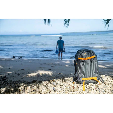 Whistler 350 AW II Camera Backpack With Top And Body Access Gray on beach, suited for rugged everyday carry for photographers
