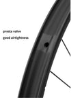 Close-up of carbon fiber rim with presta valve for Carbon Fiber Road Wheelset Pro Grade 700C Center Lock Disc Brake Thru Axle 100 And 142mm