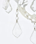 Close-up of Royal Cut Clear Maria Theresa 3 Light Crystal Wall Sconce in Chrome Finish, featuring dangling crystals.