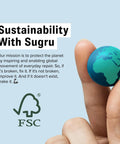 Hand holding small globe next to text 'Sustainability With Sugru' and FSC logo, promoting global repair and creation efforts.