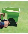 Grab And Go Handheld Grass Seed And Fertilizer Spreader For Portable Manual Lawn Garden Seeding in use spreading seeds
