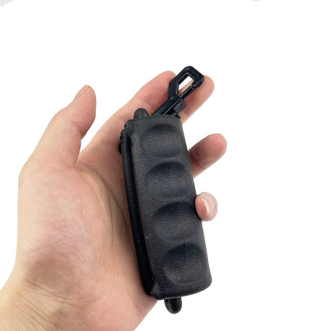 Hand holding 2 Pack Archery Arrow Puller Gripper With Belt Clip For No Fuss Target Removal Grab It Quick Soft Rubber Extractor Tool