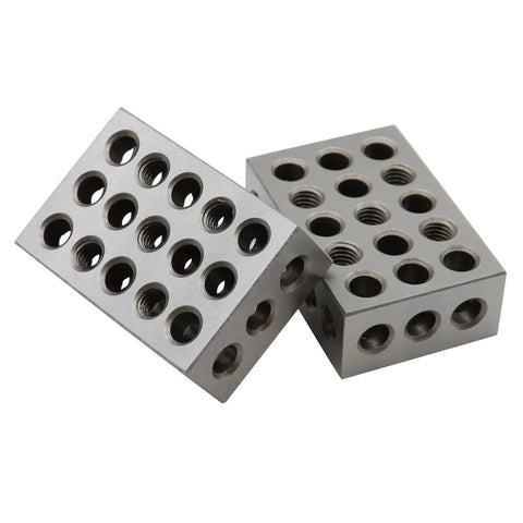 Two 1x2x3 inch hardened steel setup blocks with 23 threaded holes each.