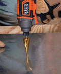Heavy Duty Step Drill Bit Set For DIY With Spiral Double Fluted Titanium Nitride Coated Bits in use on metal surface