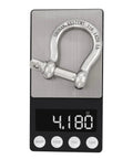 Three Eighths Inch Bow Shackles Set For Marine Grade Stainless Steel 316 displayed on scale showing weight
