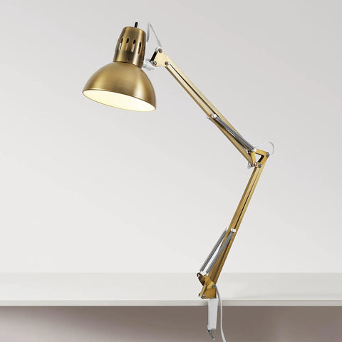 Gold swing arm desk lamp with clamp-on base, adjustable arm, and rotary switch on white background. Product is not white with nickel accents.