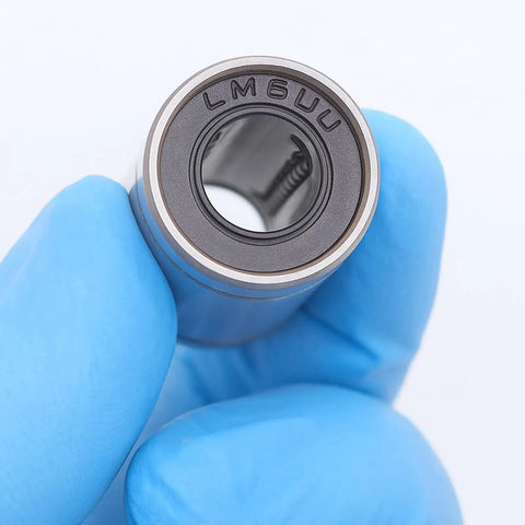 Close-up of 10 Pcs LM6UU Linear Ball Bearings 6mm Bore Carbon Steel With Double Sided Rubber Seals For CNC Machines And 3D Printers.
