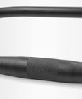 Close-up of Lightweight Aluminum 6061 Gravel Bike Handlebar For Touring Multifunction Crossbar, 690mm, black grip detail.