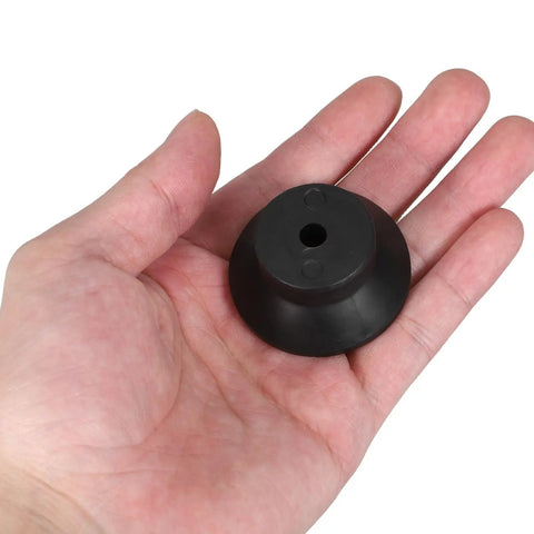 Get Your 3D Printer Level And Smooth With These Four Black Rubber Anti Vibration Pads in a hand for stability.