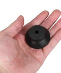 Ultimate 3D Printer Vibration Dampening Feet Pads In Black With Secure M6 Screws, rubber pad in hand for measuring stability.