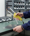 Rock Solid Workhorse Point Welder Clamps Heavy Duty Joining Pliers With Scorch Proof Handles in use with metal sheet.