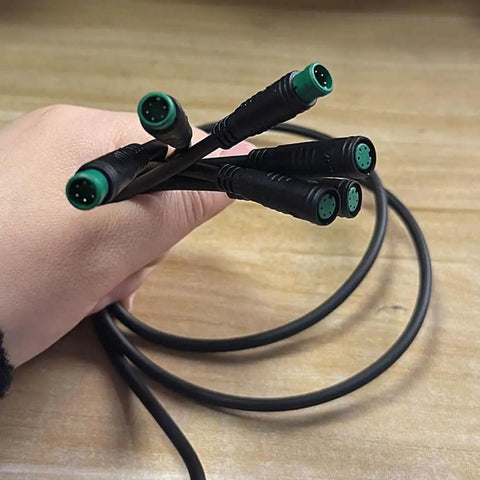 Check Out This Cool 510 Mm E Bike Display Extension Cable With 2 Inch Length That Fits 5 Pin Scooter Dashboard Wiring Perfectly For Easy Upgrades And Super Smooth Ride Control Without Any Mess Or Hassle. 5-pin black cable with green connectors, hand-held