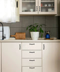 Kitchen featuring 30 Pack Solid 3 Inch Rounded Foot Arch Kitchen Cabinet Handles Matte Black Finish Curved Drawer Pulls installed on cabinets.