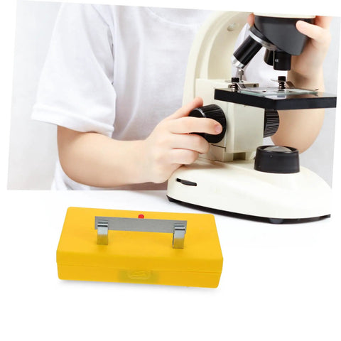 Child using Reliable Conductivity Learning Kit next to microscope, part of Multi Functional Science Lab Tool for Hands On Physics Experiments.