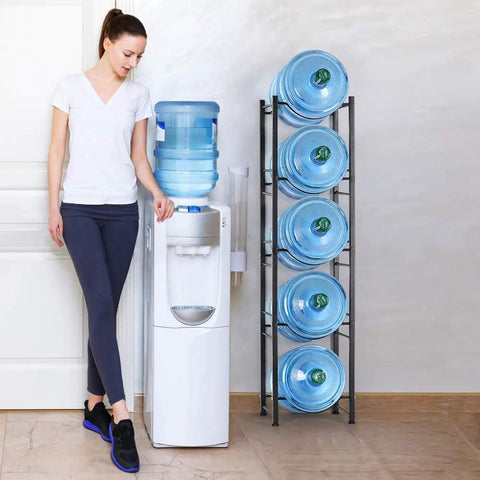 Heavy Duty 5 Tier Water Jug Rack With Detachable Shelf For 5 Gallon Jugs Built To Last Sturdy Steel Bottle Organizer next to water cooler