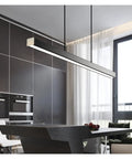 LED Long Modern Pendant Light Simple Style Droplight for Dining Room Restaurant Decoration Long Hanging Lamp Lighting Fixture in black over a kitchen island.