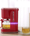 Straight Up Barista Quality Fully Automatic Bean To Cup Coffee And Espresso Maker For Home Office With Built In Grinder Zero Hassle Touch Panel Kitchen Ready Red next to freshly brewed coffee.