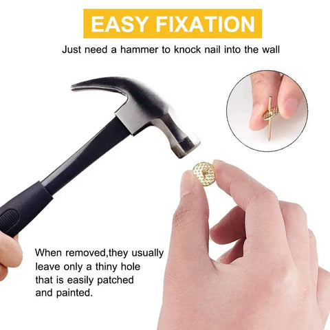 Hammer and nail from 72 Piece Picture Hanger Kit With 4 Sizes and Iron Alloy Nail Hooks For 10 To 60 Lbs, showcasing easy fixation.