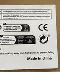 Manufacturer label for Real Deal Commercial Electric Sugar Coating Machine with warnings and recycling instructions.