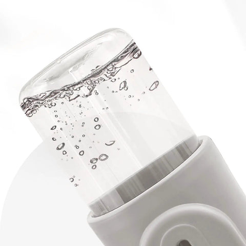 Height Adjustable 680 Ml Pet Water Dispenser And Automatic Food Feeder For Puppies Kittens And Rabbits Featuring Detachable Bowl with water bubbles.