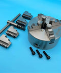 Rock Solid 130Mm Four Jaw Self Centering Lathe Chuck K12-130 with jaws and tools for precision machining on mini metal lathes.